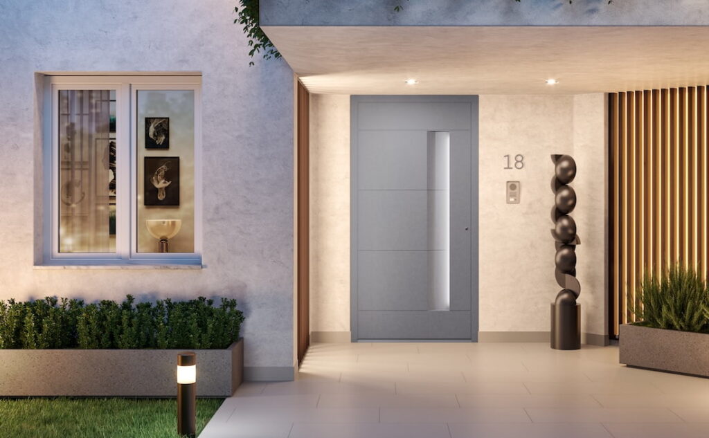 Villa con portoncino d’ingresso in alluminio Tenvis Linea Design Pro di Oknoplast, vista esterna