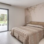 Camera da letto con porta finestra Futural OC Oknoplast