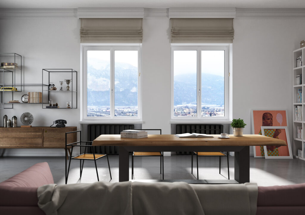 Zona living luminosa con ampia finestra Prolux Evolution Oknoplast