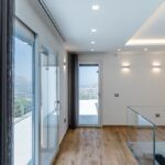 Interni luminosi con porta finestra Prolux Evolution e Scorrevole Ekosol di Oknoplast