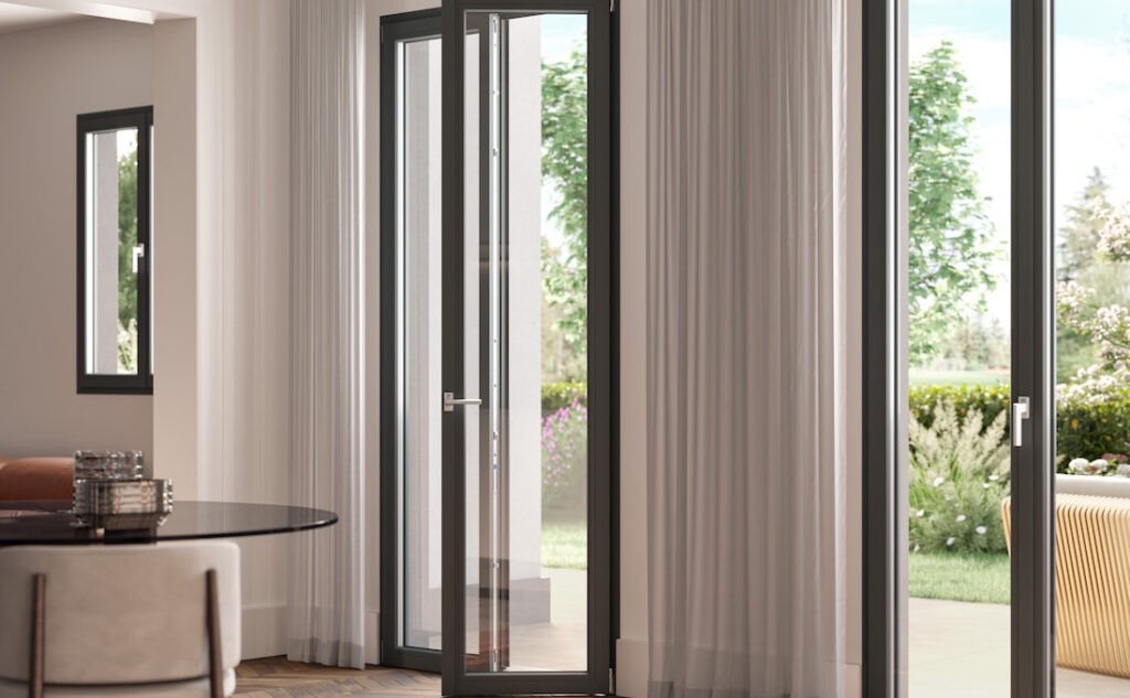 Soggiorno con porte finestre in PVC Prismatic Evolution di Oknoplast
