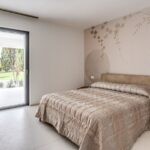 Camera da letto con porta finestra Futural OC Oknoplast