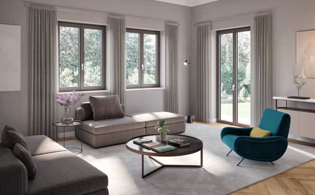 Salotto con finestre e porta finestra in PVC Prolux Evolution di Oknoplast