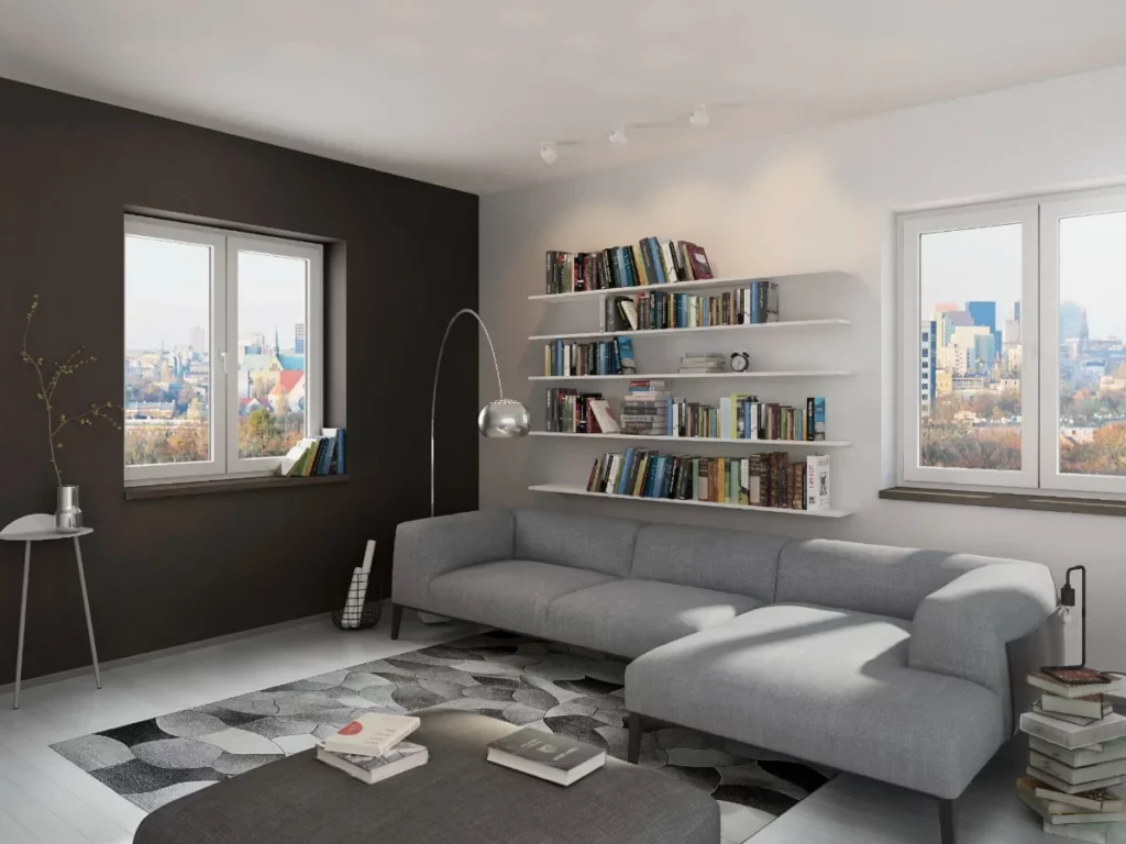 Soggiorno moderno con divano ad angolo grigio, pareti bianche e scure, finestre panoramiche sulla citt&agrave;, libreria a muro.